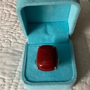 New red with lines of black go thru thru stone!